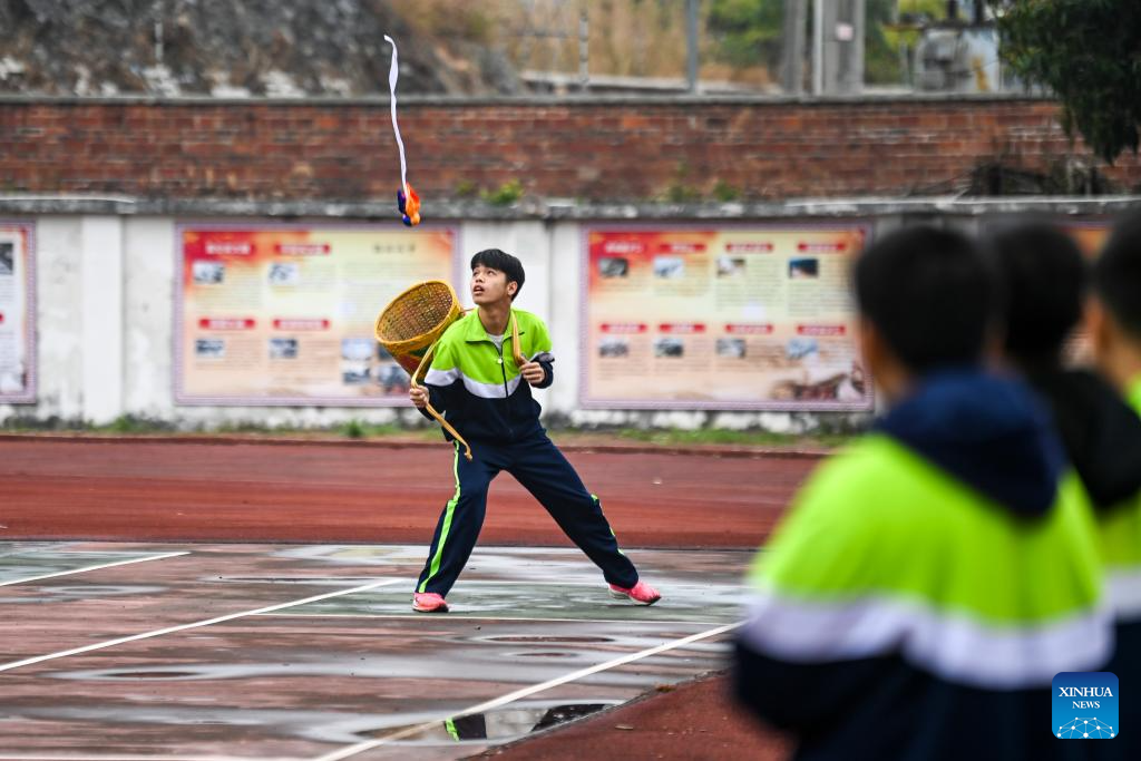 Embroidered balls carry profound folk heritage in China's Guangxi