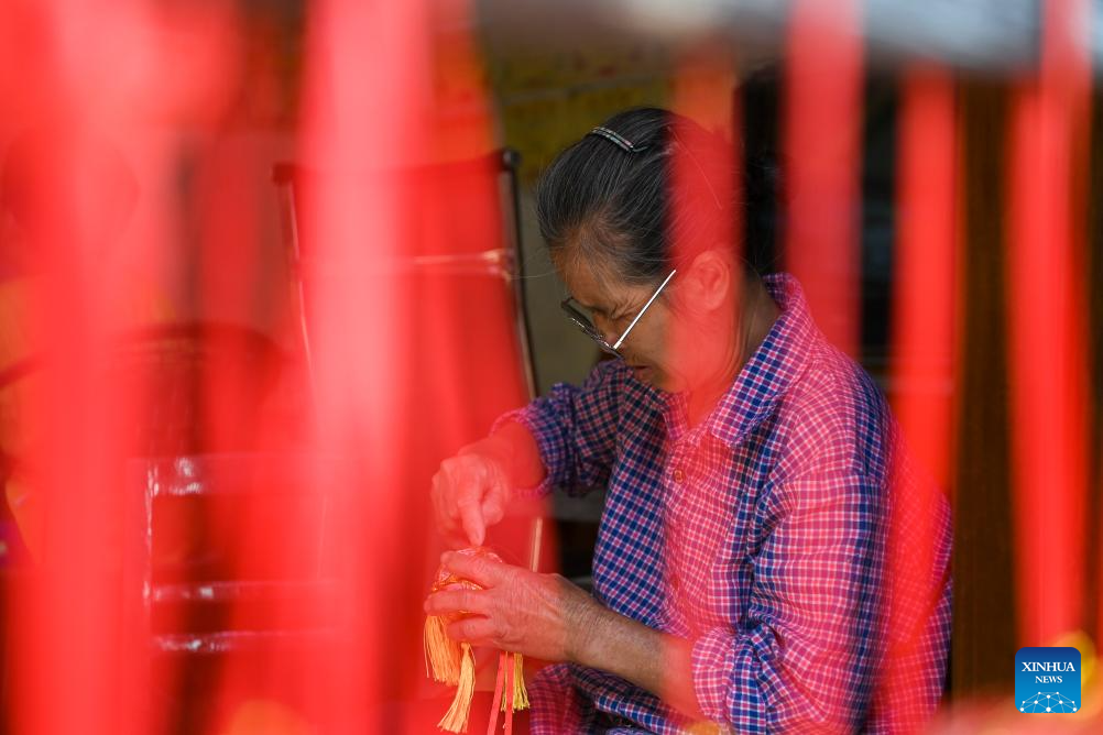 Embroidered balls carry profound folk heritage in China's Guangxi