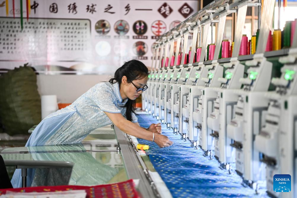 Embroidered balls carry profound folk heritage in China's Guangxi