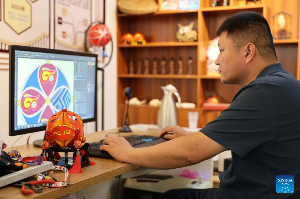 Embroidered balls carry profound folk heritage in China's Guangxi