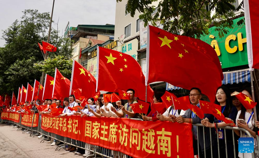 Xi arrives in Hanoi for state visit to Vietnam