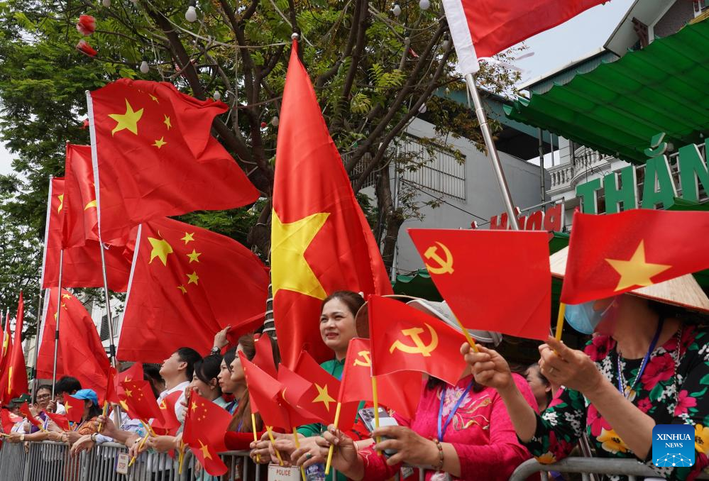 Xi arrives in Hanoi for state visit to Vietnam