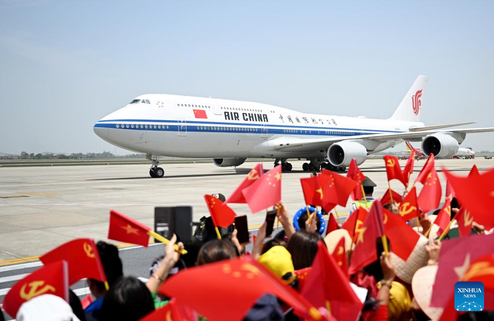 Xi arrives in Hanoi for state visit to Vietnam