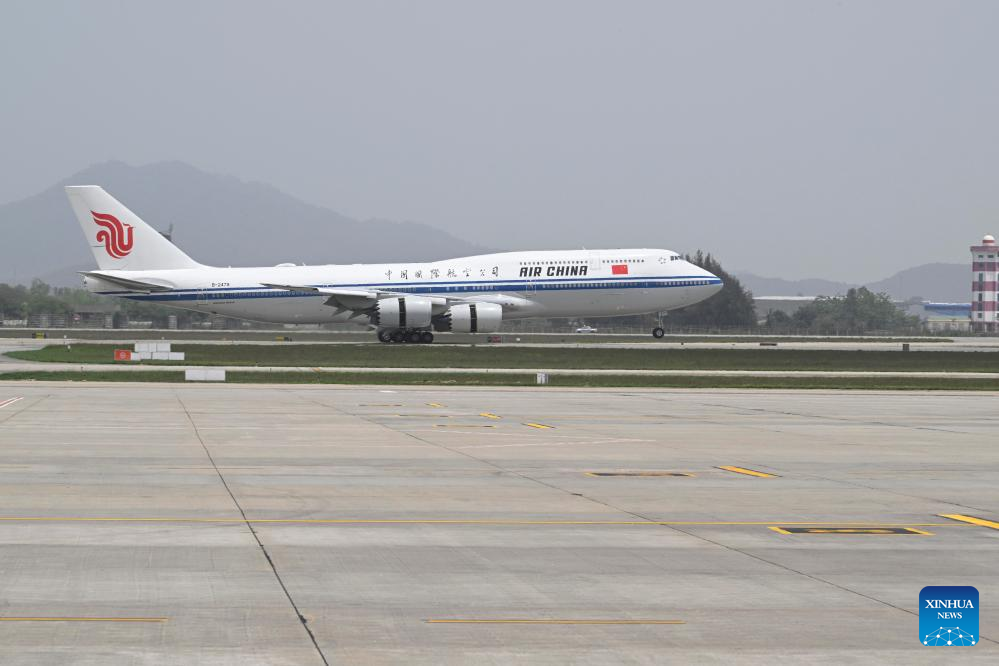 Xi arrives in Hanoi for state visit to Vietnam