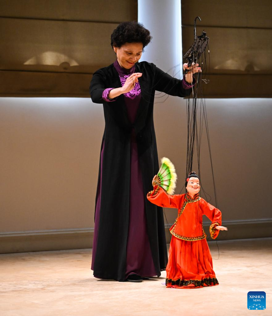 Chinese artists perform Quanzhou string puppetry at Bogazici University in Istanbul, Türkiye
