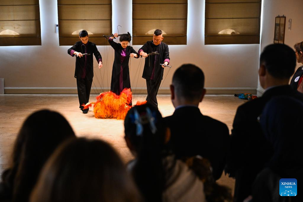 Chinese artists perform Quanzhou string puppetry at Bogazici University in Istanbul, Türkiye