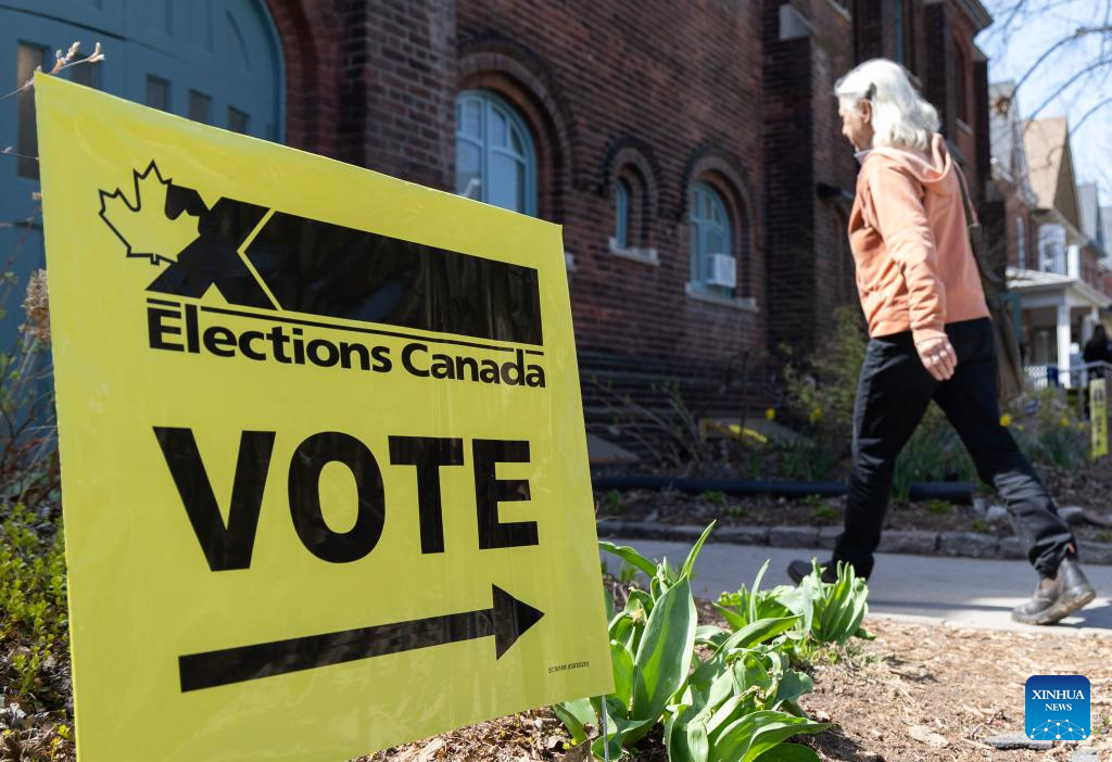 Millions of Canadians turn up for voting amid Trump's fresh threat
