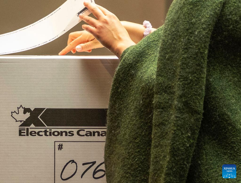 Millions of Canadians turn up for voting amid Trump's fresh threat