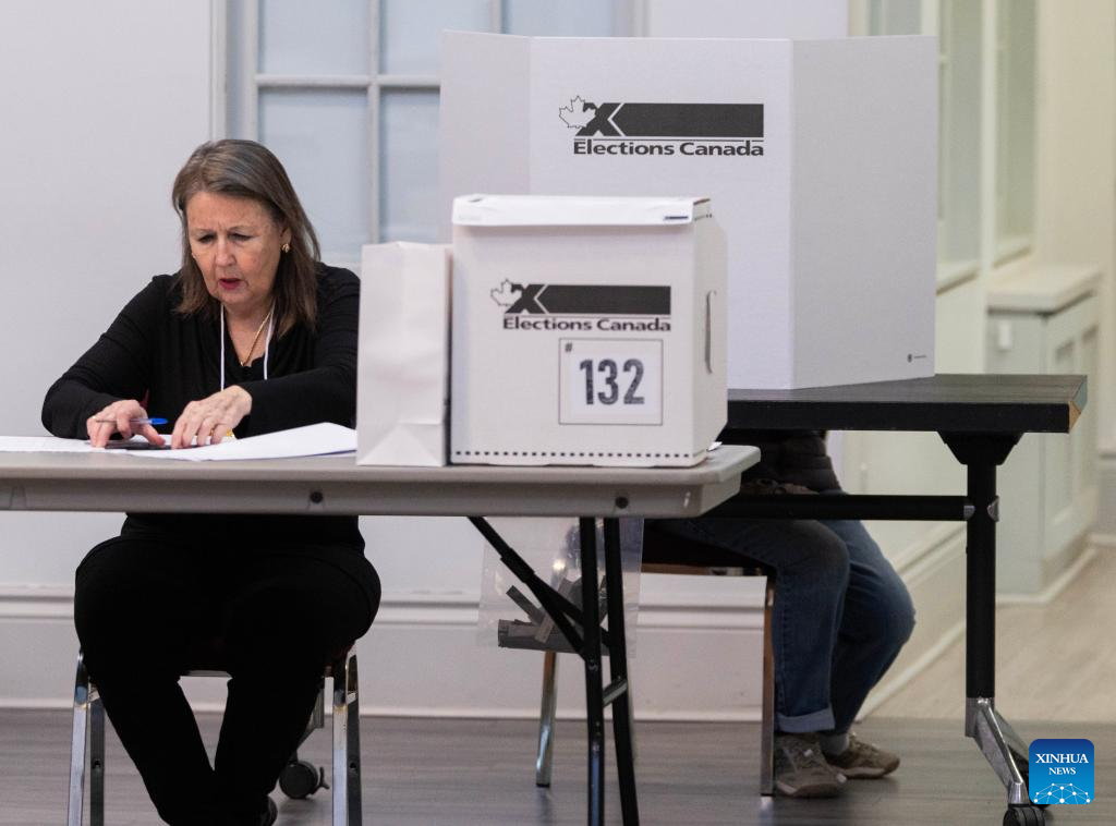 Millions of Canadians turn up for voting amid Trump's fresh threat