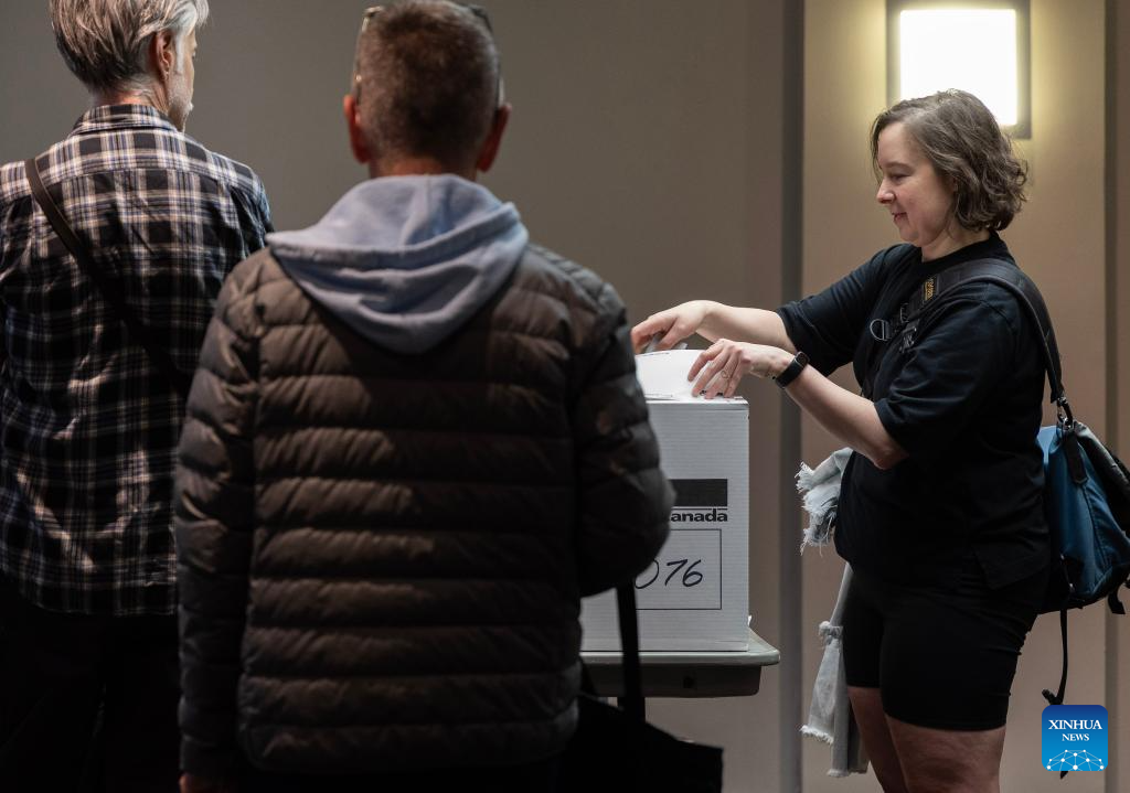 Millions of Canadians turn up for voting amid Trump's fresh threat