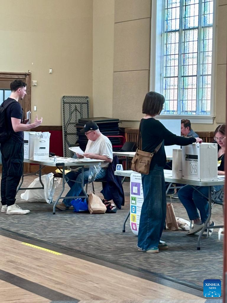 Millions of Canadians turn up for voting amid Trump's fresh threat