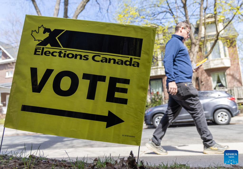 Millions of Canadians turn up for voting amid Trump's fresh threat