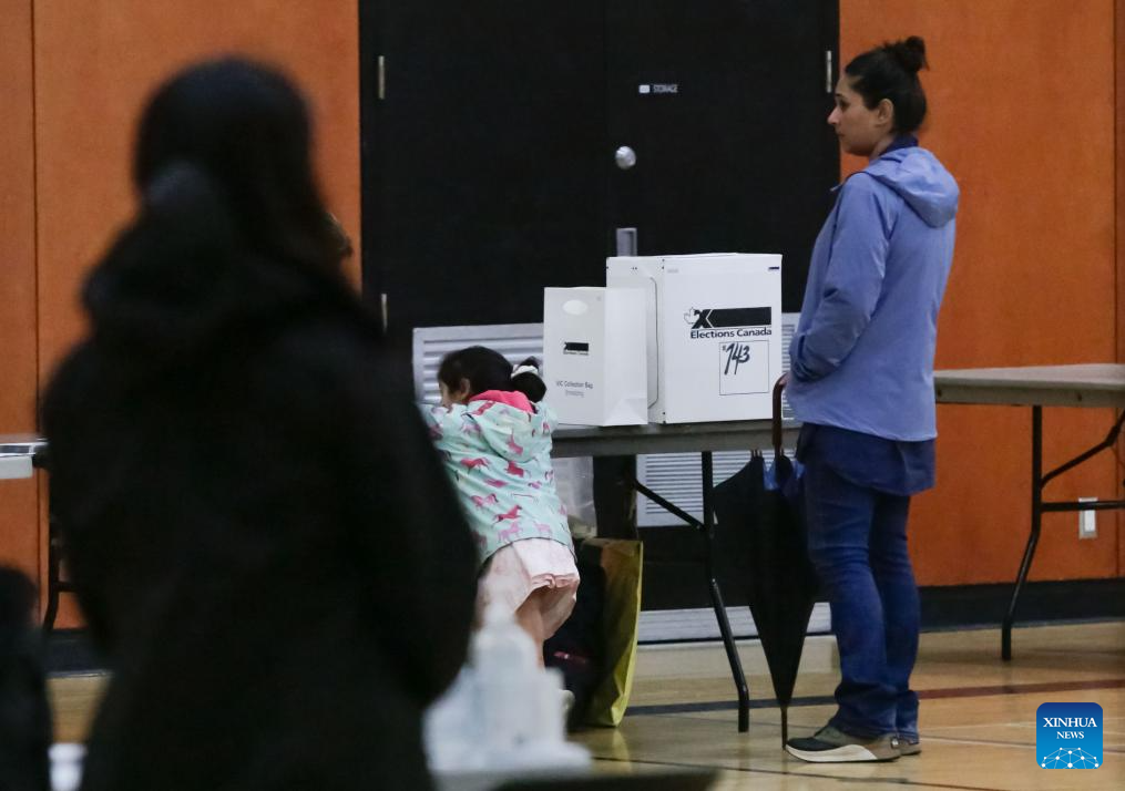 Millions of Canadians turn up for voting amid Trump's fresh threat