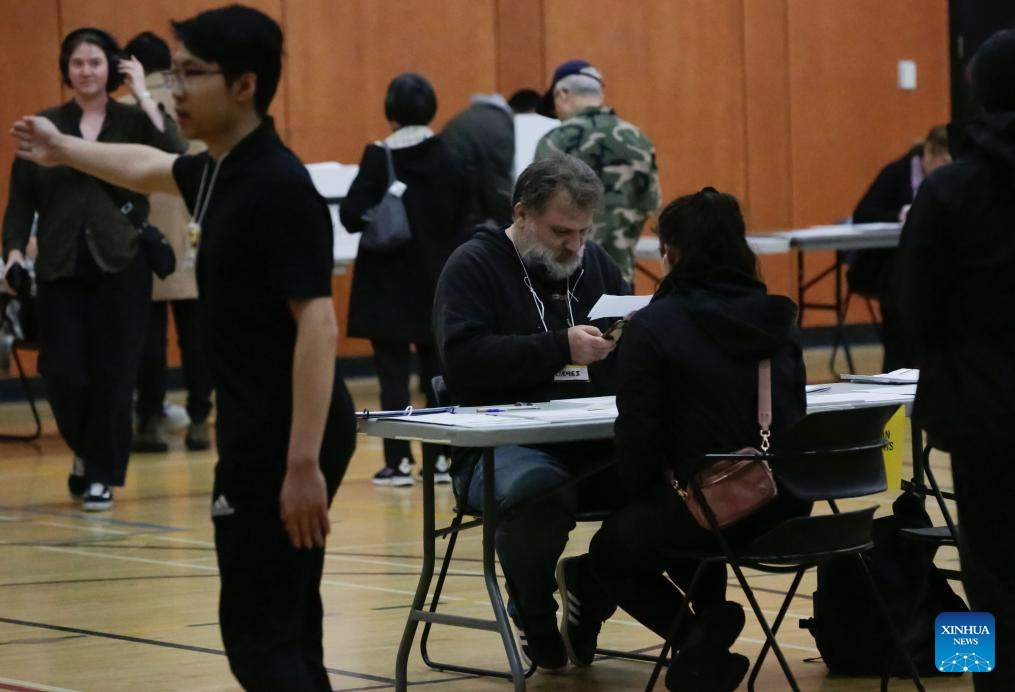 Millions of Canadians turn up for voting amid Trump's fresh threat