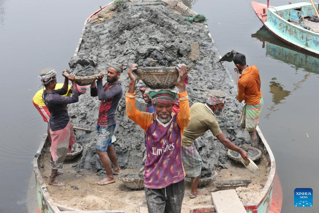 People work at brick factory in Dhaka, Bangladesh
