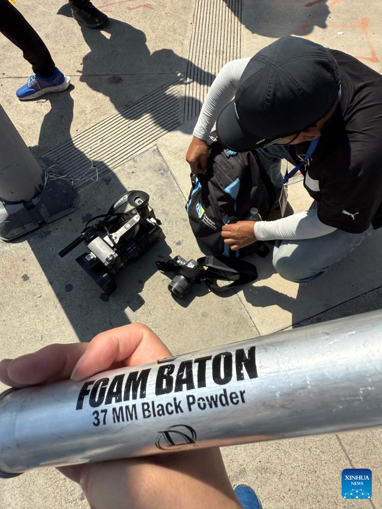 Police clash with protesters in Los Angeles