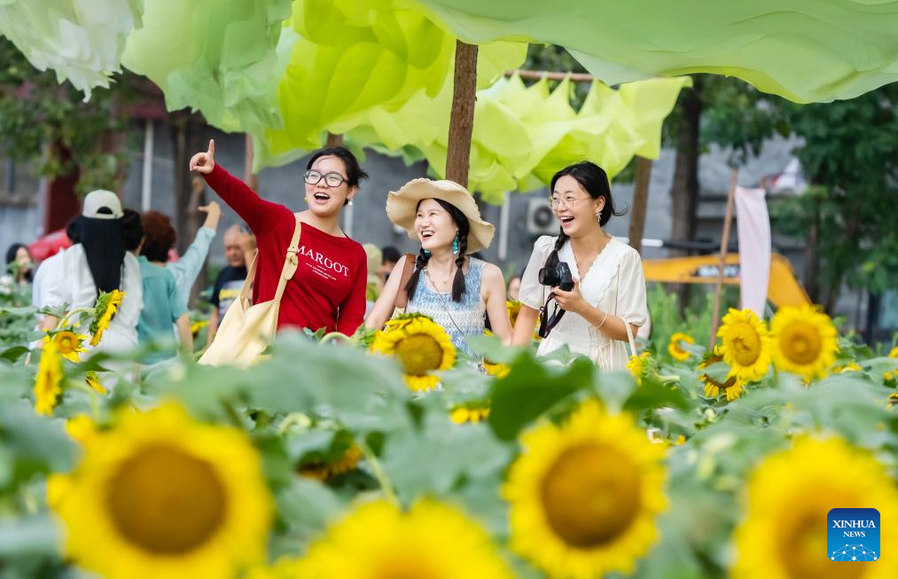 Summer travel in full swing across China