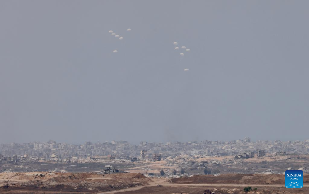 Aid packages airdropped over Gaza Strip