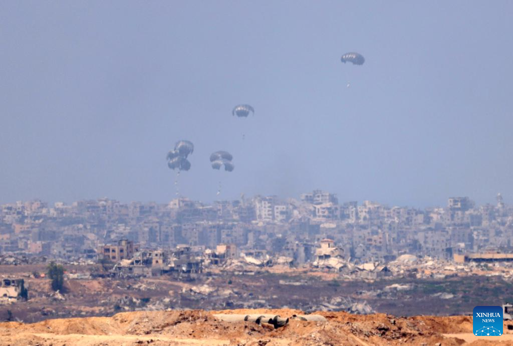 Aid packages airdropped over Gaza Strip