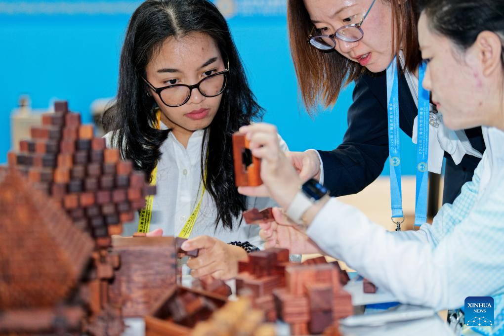 A glimpse of intangible cultural heritage experience zone at press center of SCO Summit 2025 in Tianjin