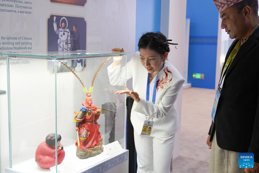 A glimpse of intangible cultural heritage experience zone at press center of SCO Summit 2025 in Tianjin