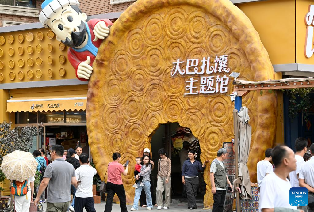 Traditional naan-making techniques inherited, developed in Xinjiang