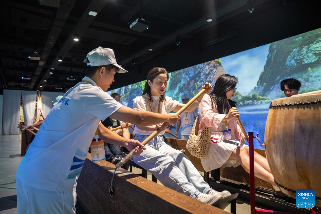 People visit Wuxi Intangible Cultural Heritage Park in Huaihua, China's Hunan