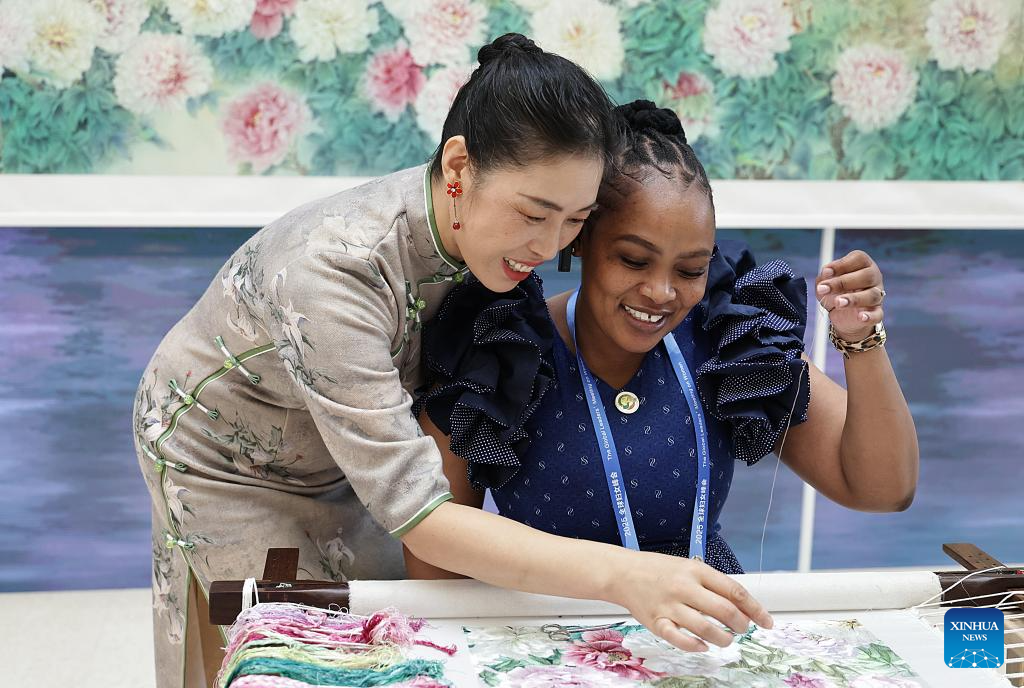 In pics: exhibition showcasing China's progress in digital and intelligent empowerment for women and girls in Beijing