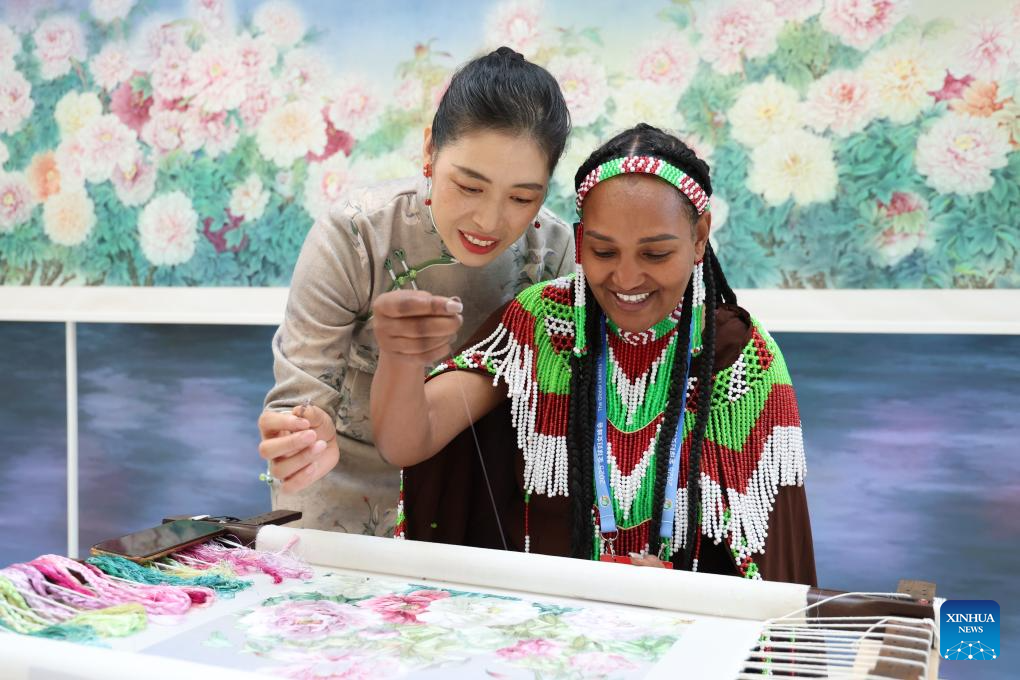 In pics: exhibition showcasing China's progress in digital and intelligent empowerment for women and girls in Beijing
