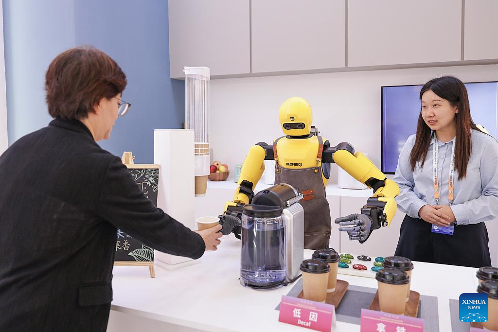 In pics: exhibition showcasing China's progress in digital and intelligent empowerment for women and girls in Beijing