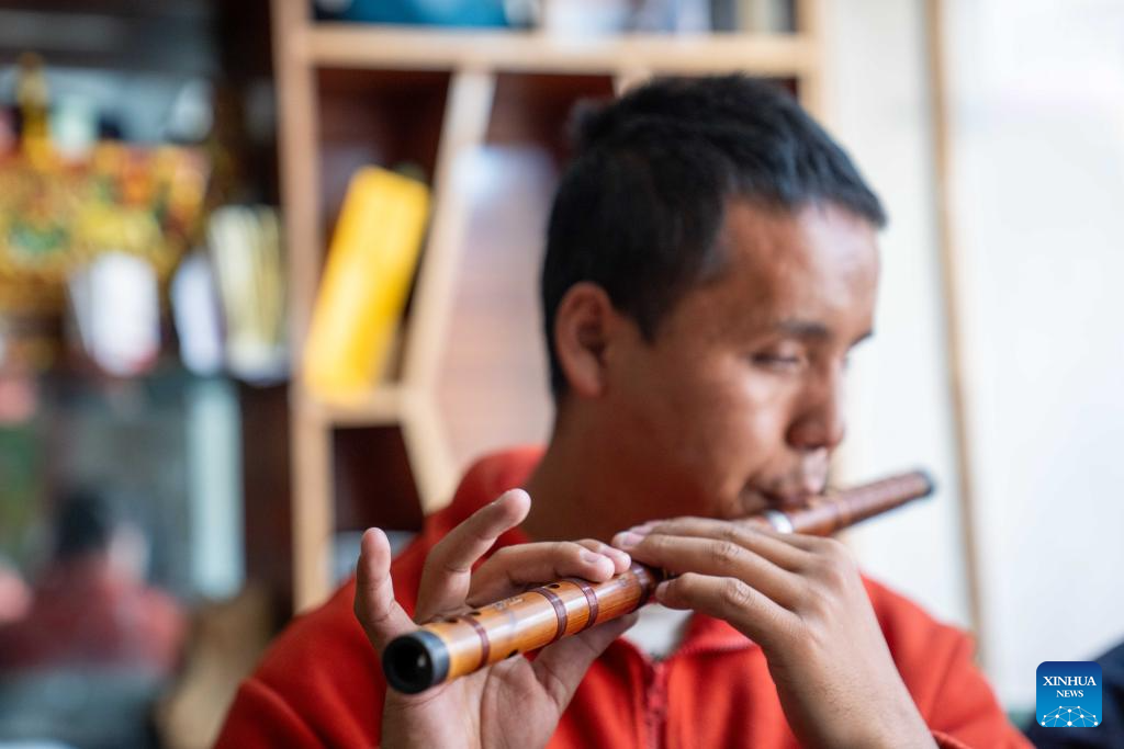 Music lights path for Xizang's first band composed of visually-impaired members