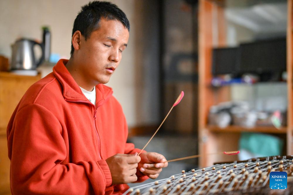 Music lights path for Xizang's first band composed of visually-impaired members