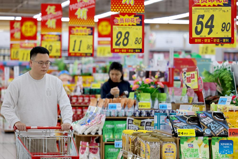 China's GDP expands 5.2 pct year on year in first three quarters