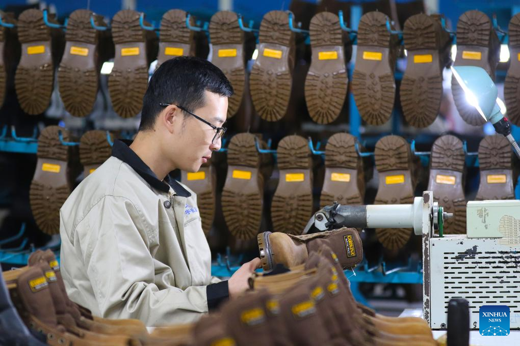 China's GDP expands 5.2 pct year on year in first three quarters