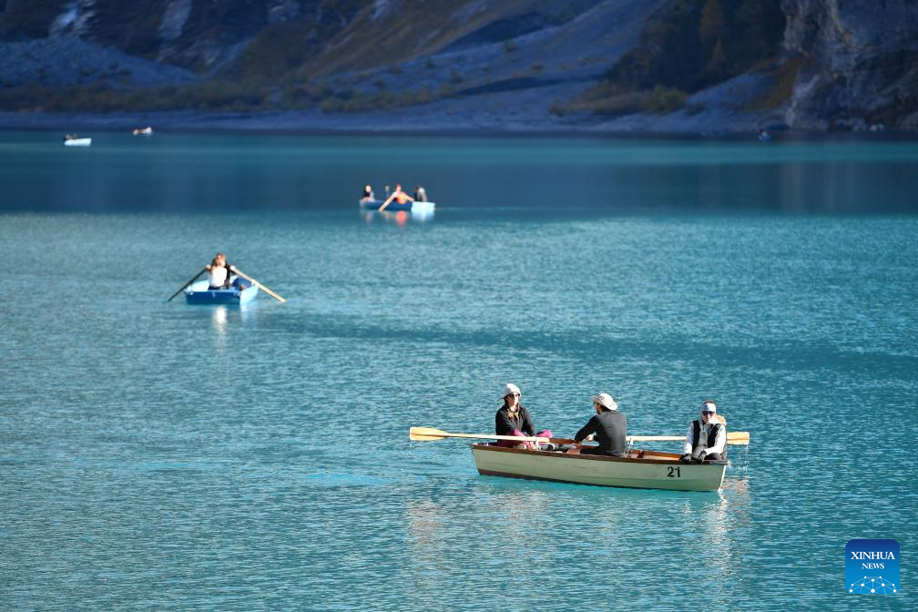 Autumn scenery of Lake Oeschinen in Bernese Oberland, Switzerland
