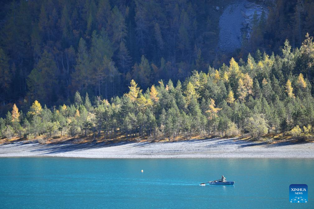 Autumn scenery of Lake Oeschinen in Bernese Oberland, Switzerland