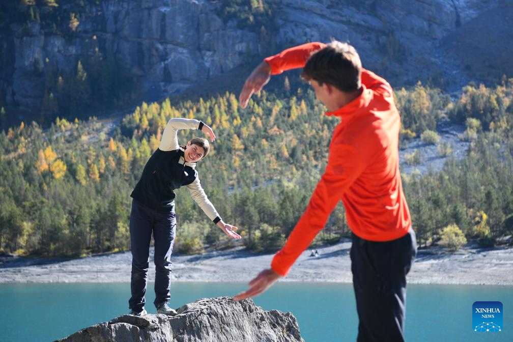 Autumn scenery of Lake Oeschinen in Bernese Oberland, Switzerland
