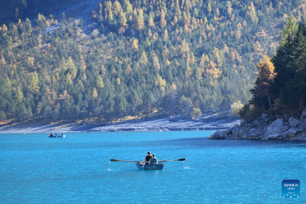 Autumn scenery of Lake Oeschinen in Bernese Oberland, Switzerland