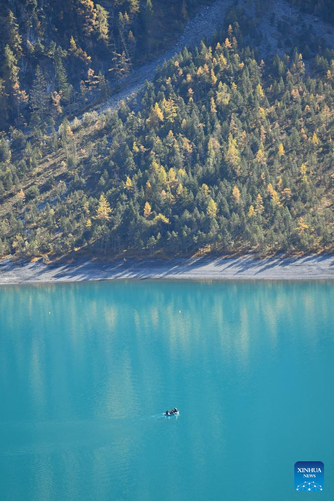 Autumn scenery of Lake Oeschinen in Bernese Oberland, Switzerland