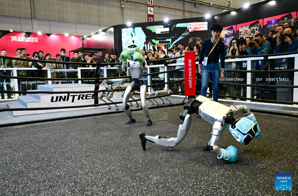 Humanoid robots perform fighting at 8th CIIE in Shanghai