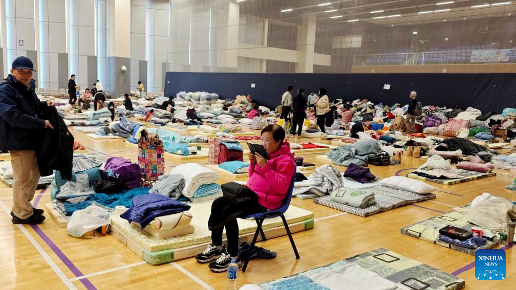 In pics: aftermath of Hong Kong building fire