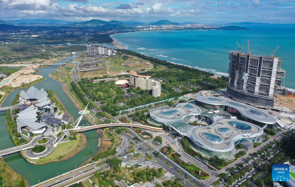 Customers shop at duty-free shopping mall in Sanya, China's Hainan