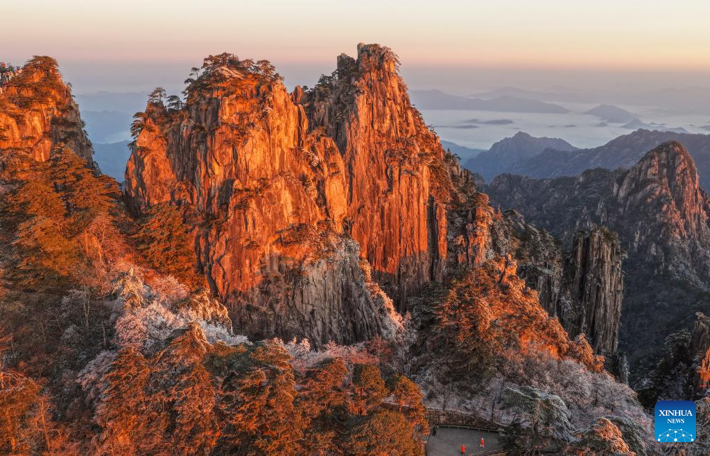 Scenery of Huangshan Mountain scenic area at sunrise after snow in China's Anhui