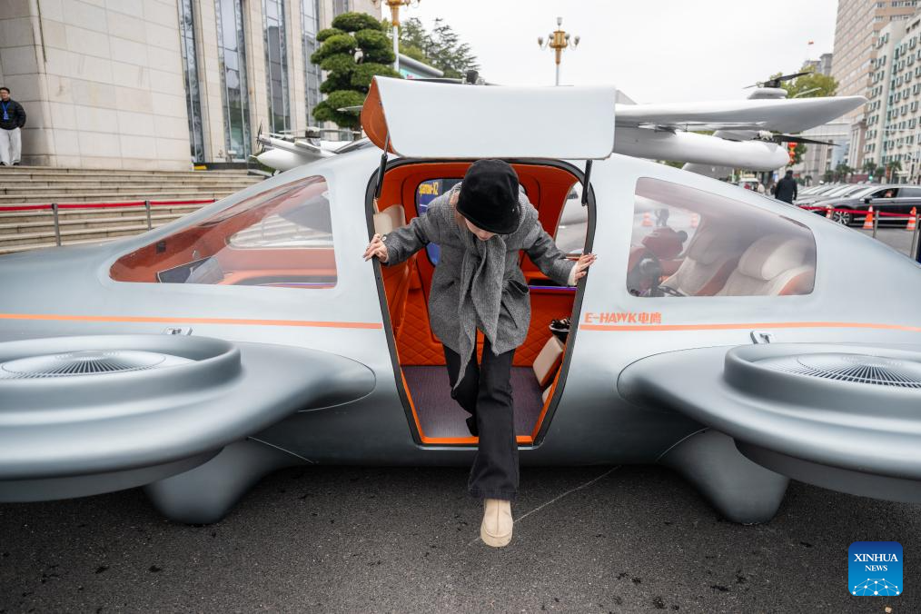 Electric vertical takeoff and landing aircraft, humanoid robots make debut in Wuhan, China's Hubei