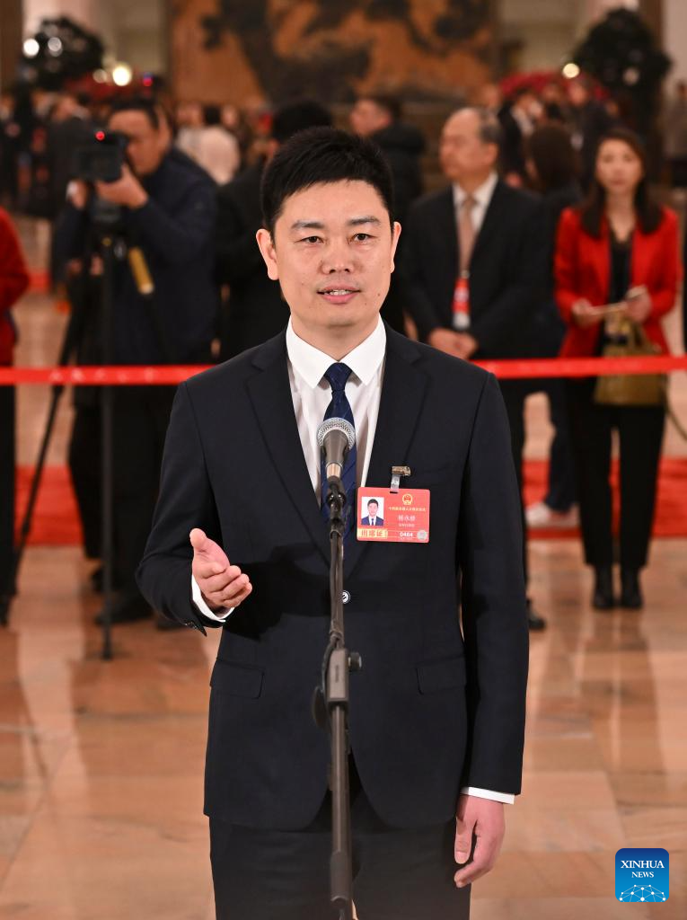 NPC deputies attend group interview ahead of annual session