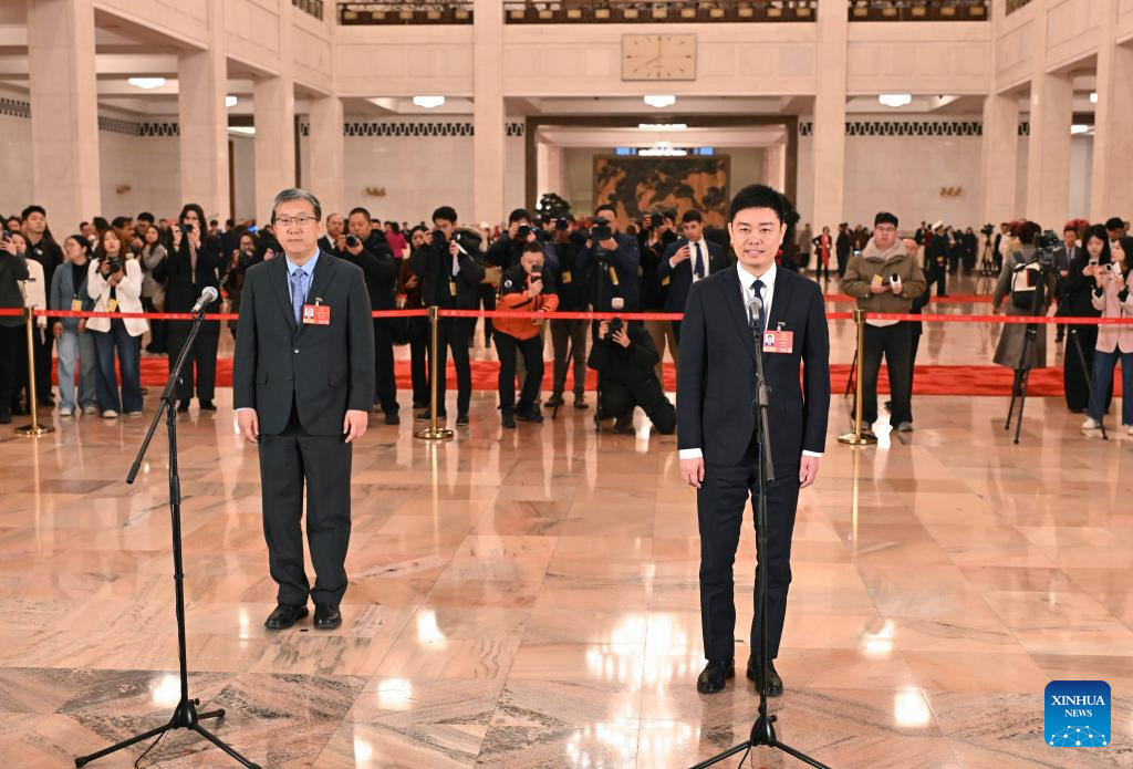 NPC deputies attend group interview ahead of annual session