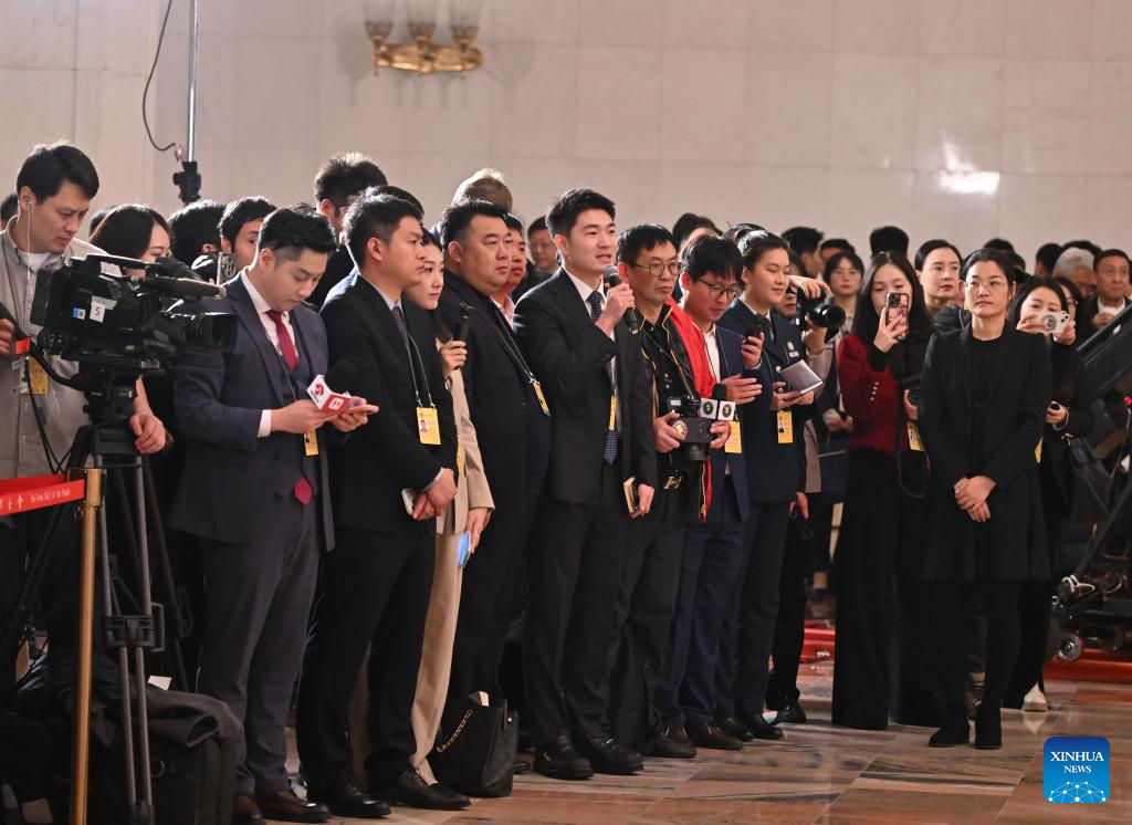 NPC deputies attend group interview ahead of annual session