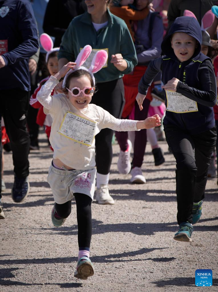 People take part in Big Easter Run at Jericho Beach in Canada
