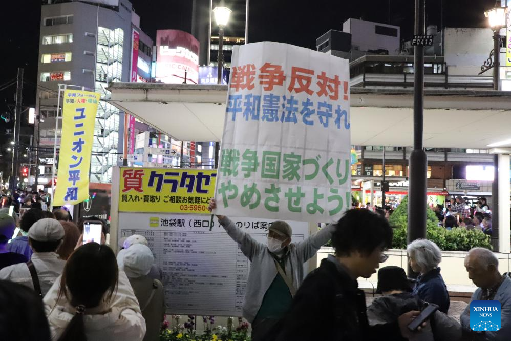 Japan opposition parties, citizens rally against gov't move to ease arms export rules