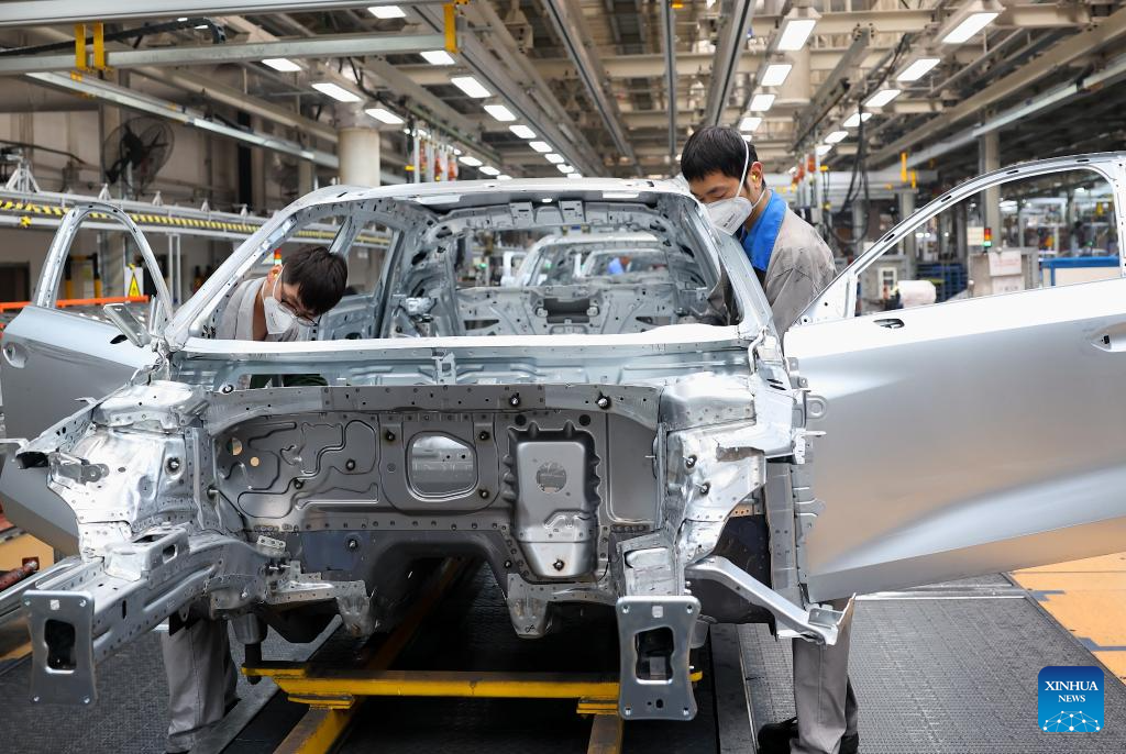 China's auto output, sales rise sharply in March